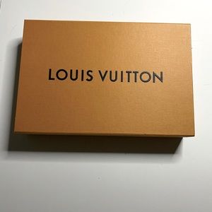 Brand new authentic box with paper and ribbon